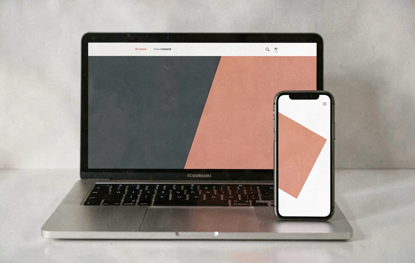 A responsive website shown across laptop and phone frames